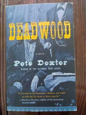 Deadwood by Pete Dexter - Blue & Yellow Paperback Novel